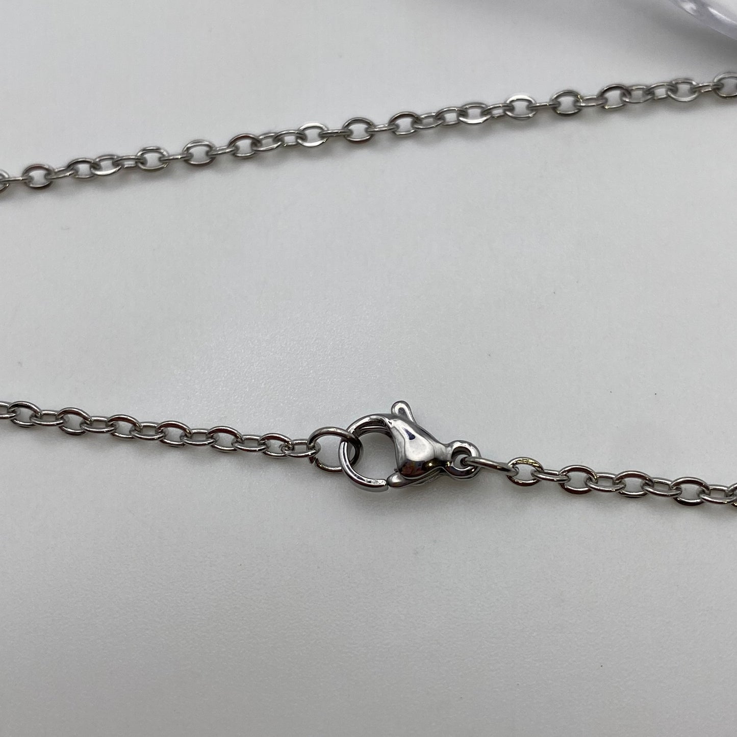 Silver Abstract Half Face Necklace