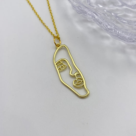 Gold Abstract Half Face Necklace