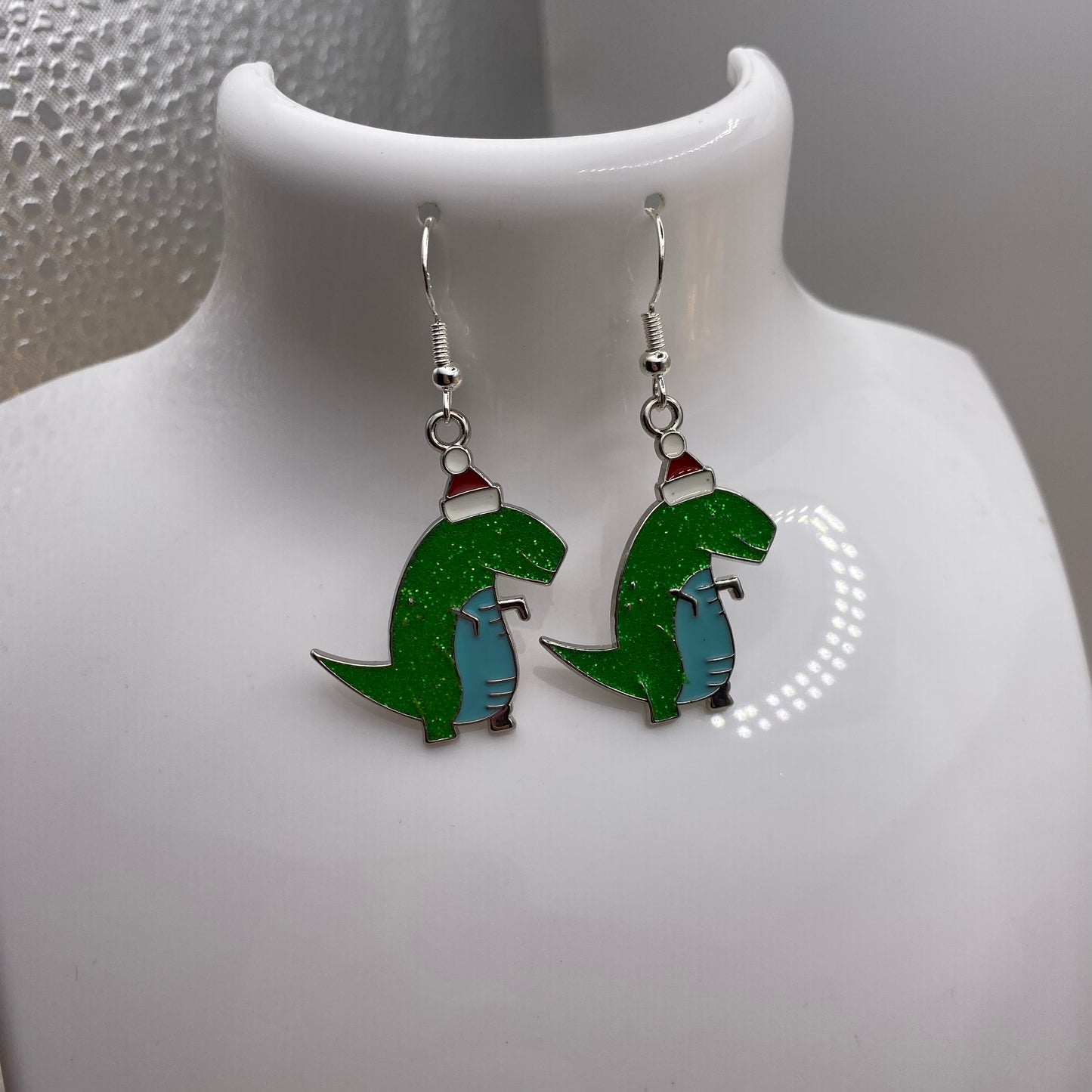 Green T-Rex Dinosaur Santa Earrings